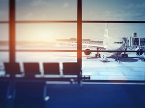 airplane waiting for departure in airport terminal