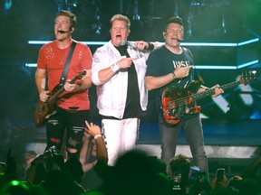 Joe Don Rooney, Gary LeVox and Jay DeMarcus of the band Rascal Flatts perform at Ascend Amphitheater on July 6, 2019 in Nashville, Tenn. (Jason Kempin/Getty Images)