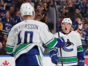 Vancouver Canucks' winger Brock Boeser celebrates his third-period goal against the Buffalo Sabres on Saturday at KeyBank Center. The Canucks snapped a two-game losing streak with a 6-3 win. They play Sunday in Minnesota.