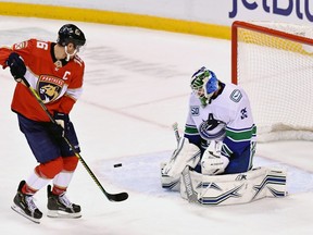 Vancouver Canucks goaltender Thatcher Demko (35) blocks a shot by Florida Panthers center Aleksander Barkov (16) during the second period at BB&T Center.
