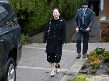 VANCOUVER, BC - JANUARY 20: Huawei Technologies Chief Financial Officer Meng Wanzhou leaves her house on her way to a court appearance on the first day of her extradition trial on January 20, 2020 in Vancouver, Canada. The United States government accused Wanzhou of fraud after HSBC continued trade with Iran while sanctions were in place.