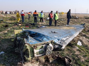 Rescue teams at the scene of a Ukrainian airliner crash near Imam Khomeini airport in the Iranian capital Tehran, Jan. 8, 2020.