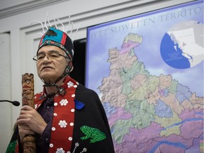 Wet'suwet'en Hereditary Chief Namoks (John Ridsdale) speaks as Indigenous nations and supporters gather to show support for the Wet'suwet'en Nation before marching together in solidarity, in Smithers Jan. 16, 2019.