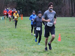 Kulninder Munday of Surrey, right, leads this group through the Aldergrove Regional Park trails in last Sunday's Aldergrove Ramble. The Fraser Valley Trail Race Series wraps up on Feb. 23 with the Fort-2-Fort races in Fort Langley.