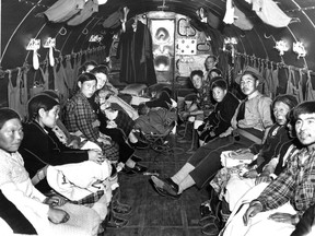 A group of Inuit patients are airlifted to an "Indian hospital" in Montreal from Baffin Island aboard an RCAF Dakota aircraft in a September 1951 file photo.