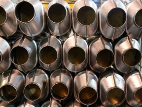 Catalytic converter emission control devices stacked in a factory in Mansfield, U.K. Converters built using palladium convert toxic emissions such as carbon monoxide and nitrogen oxide to carbon dioxide, water and nitrogen.