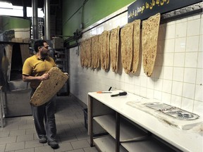 Afshin Nejad working in the Afra Bakery in North Vancouver, where many Iranian-Canadians are feeling the tensions arising from the U.S. killing of General Qassem Soleimani in Baghdad.