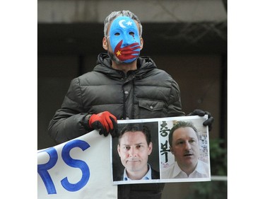 VANCOUVER, BC., January 20, 2020 - Demonstrators outside BC Supreme Court as the extradition hearing for Huawei executive Meng Wanzhou begins in Vancouver, BC., January 20, 2020.  The lawyer for the Attorney General will make opening arguments and the defence will argue double criminality. (NICK PROCAYLO/PNG)   00060095A ORG XMIT: 00060095A [PNG Merlin Archive]