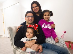 Dad Saurabh Kalra with wife Shilpa and daughters Mysha, now 8, and Myra, 4, at Langara Gardens in Vancouver on Jan. 21.