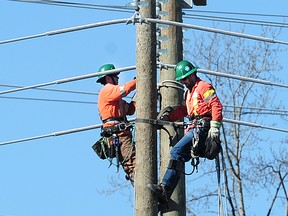 File photo of power technicians training for BC Hydro.