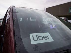 An Uber driver's vehicle is seen after the company launched service, in Vancouver on Jan. 24.