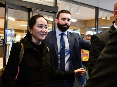 Huawei Chief Financial Officer Meng Wanzhou leaves B.C. Supreme Court on a lunch break during the start of her extradition hearing in Vancouver, British Columbia, Canada January 20, 2020.  REUTERS/Jennifer Gauthier