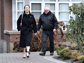 Huawei Chief Financial Officer Meng Wanzhou leaves her home to attend her extradition hearing at B.C. Supreme Court in Vancouver.