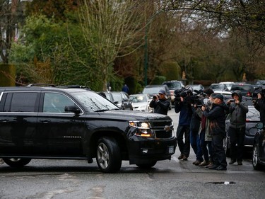 Media photograph a vehicle driving Huawei Chief Financial Officer Meng Wanzhou from her home to attend the start of her extradition hearing at B.C. Supreme Court in Vancouver, British Columbia, Canada January 20, 2020.  REUTERS/Lindsey Wasson