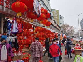 People shop for Chinese New Year on Jan. 22, 2020 in Wuhan, China.