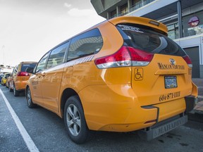 Wheelchair-accessible taxis outside Canada Place.