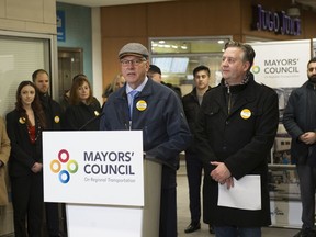 Township of Langley Mayor Jack Froese speaks at a media conference at the Broadway-City Hall SkyTrain station in Vancouver before members of the Mayors' Council flew to Ottawa to lobby the federal government.