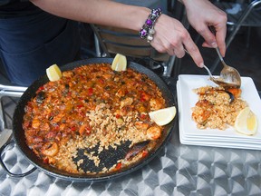 Spanish cuisine: especial paella del senyoret ciega (containing pork, chicken, lamb, fish and seafood).