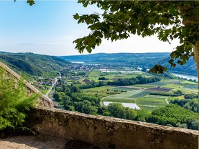 View of the Rhone valley from the church porch of Tupin-et-Semons, France.