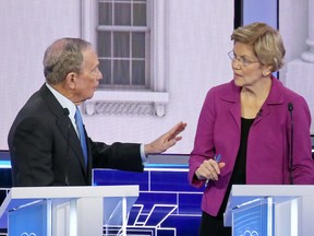 Democratic presidential candidates Michael Bloomberg and Elizabeth Warren debate at Paris Las Vegas on February 19, 2020 in Las Vegas, Nevada.