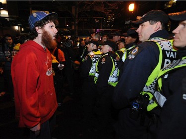 This man was one of the olympic protesters gathered on Robson at Beatty, at the west side of BC Place, home of the opening ceremonies of the 2010 Vancouver Olympic Games.  They were met by many members of the Vancouver Police.   (Stuart Davis/PNG)  (For story by Doug Ward)  -- PNG0212N PROTEST 02    TRAX NUMBER   00042480A.  [PNG Merlin Archive]