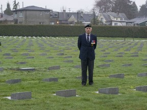 Retired major Gino Simeoni, B.C. branch president of the Last Post Fund, at Mountain View Cemetery on Fraser Street in Vancouver.
