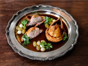 Cailles en Sarcophage (stuffed quails in puff pastry), created by chef J-C Poirier at St. Lawrence in Vancouver.