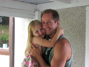 Steve Blackthorne, pictured with his daughter Grace, had life-changing surgery to implant a deep-brain stimulation electrode.