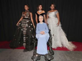 Former NASA mathematician Katherine Johnson seated backstage at the Academy Awards on Feb. 26, 2017. Standing behind Johnson are actors Janelle Monae, Taraji P. Henson and Octavia Spencer (left to right), who starred in Hidden Figures. Johnson, whose work played a key role in getting astronauts to the moon and back in the 1960s, died on Feb. 24, 2020 at the age of 101.