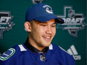 Jett Woo speaks to the media after being selected 37th overall by the Vancouver Canucks during the 2018 NHL Draft at American Airlines Center on June 23, 2018 in Dallas, Texas.