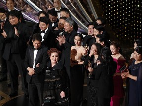 Miky Lee, Kwak Sin Ae and Bong Joon Ho react after winning the Oscar for Best Picture for "Parasite" at the 92nd Academy Awards in Hollywood, Los Angeles, California, U.S., February 9, 2020. REUTERS/Mario Anzuoni