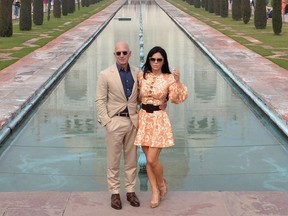 Chief Executive Officer of Amazon Jeff Bezos (L) and his girlfriend Lauren Sanchez pose for a picture during their visit at the Taj Mahal in Agra on January 21, 2020.