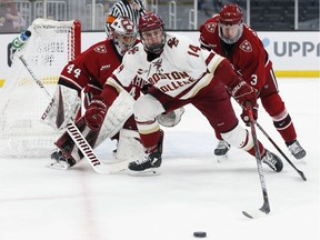Harvard's Jack Rathbone (right) had four points in two games this past week.