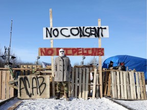 Supporters of the indigenous Wet'suwet'en Nation's hereditary chiefs camp at a railway blockade as part of protests against British Columbia's Coastal GasLink pipeline, in Edmonton, Alberta, Canada February 19, 2020.