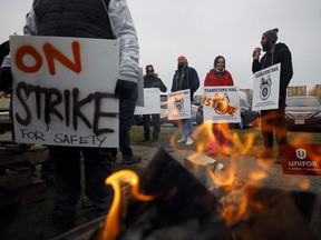 Canadian National Railway Co. employees picket during a strike in Brampton, Ontario, in November, 2019.