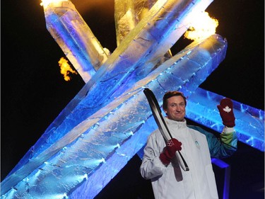 Hockey great Wayne Gretzky lights the outdoor Vancouver 2010 Olympic cauldron at the conclusion of the Olympic Opening Ceremony in Vancouver, BC Friday, February 12, 2010.