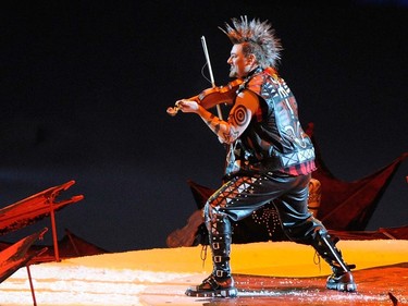 A fiddler at BC Place Stadium during the  opening ceremony for the 2010 Winter Olympic Games in Vancouver February 12, 2010.  (Ric Ernst / Canwest News Service).  CNS-OLY-OPEN