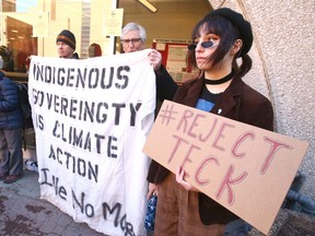 Protesters on both sides of the Frontier mine issue gather in downtown Calgary on Wednesday, Jan. 22, 2020.