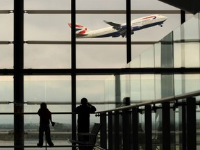 A British Airways passenger jet takes off from Terminal 5, at Heathrow Airport, west of London, on October 29, 2010.