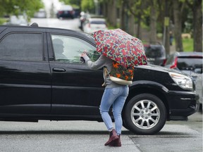 VANCOUVER May 14 2019. Pedestrians and cars mix at a residential street intersection in east Van, Vancouver May 14 2019.   ( Gerry Kahrmann  /  PNG staff photo) 00057405A   Story by  Dan Fumano [PNG Merlin Archive]