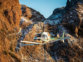 A helicopter sporting the equipment necessary for an aerial magnetic survey, flies over Northern Vancouver Island during a $1.1 million project, sponsored by Geoscience B.C., to detect and map mineral potential over a 6,000-square-kilometre swatch of the Island from Port McNeil to Thasis during the fall of 2019.