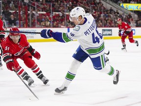 Canucks centre Elias Pettersson fires a shot on goal against the Carolina Hurricanes during their NHL game at PNC Arena in Raleigh, N.C., on Feb. 2, 2020.