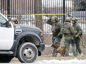 Police work outside the Molson Coors Brewing Co. campus in Milwaukee on Wednesday, Feb. 26, 2020, after reports of a possible shooting.