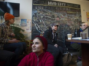 Protesters stage a sit-in at B.C. Attorney-General David Eby's constituency office on West Broadway in Vancouver, B.C. on Thursday, February 13, 2020.