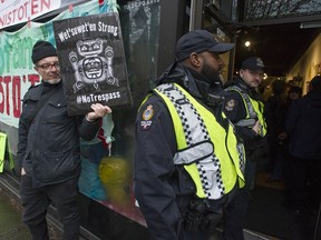 About 100 protesters stage a sit-in at B.C. Attorney-General David Eby's constituency office on West Broadway in Vancouver, B.C. Thursday, February 13, 2020. The action is part of the ongoing movement in support of hereditary chiefs from Wet'suwet'en who are in opposition to the GasLink pipeline project.
