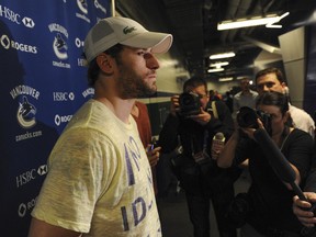 Ryan Kesler meets the press at the end of the Canucks' 2012-13 season at Rogers Arena. He seemed to make surliness a point of pride during his years with the Canucks, says columnist Ed Willes.