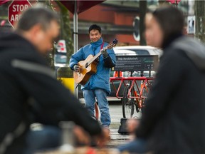 Busker Keegan Chen performs at Granville Island in Vancouver, BC, February 23, 2020.