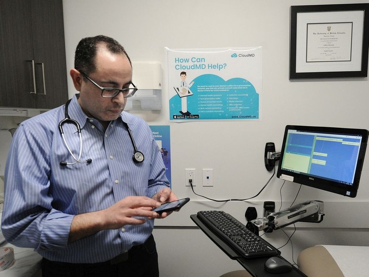  Dr. Essam Hamza uses the CloudMD app he helped develop for doctor-patient consultations.