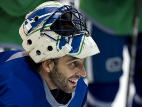 Roberto Luongo was all smiles at this Vancouver Canucks practice in 2013. Will the day ever comes when Luongo's jersey number is retired to the rafters of Rogers Arena?