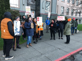 Protesters outside the Government Communications and Public Engagement office on Government Street on Friday, Feb. 14, 2020.
